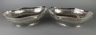 A pair of silver plated oval pierced deep dishes