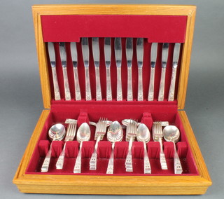 A modern canteen of silver plated cutlery for 6