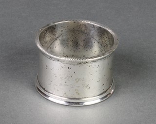 A Continental white metal napkin ring 