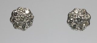 A pair of 18ct white gold daisy cluster diamond ear studs, approx. 1.80ct