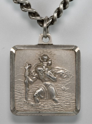 A silver St Christopher on chain