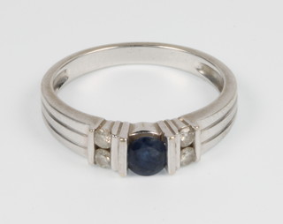 A 14ct gold sapphire and diamond banded ring, size N