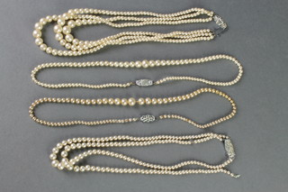 4 imitation pearl necklaces