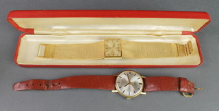 A gentleman's gilt cased automatic Rotary wristwatch, a gilt ditto