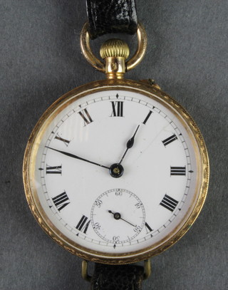 An Edwardian 14ct fob watch with seconds at 6 o'clock converted on to a bracelet 