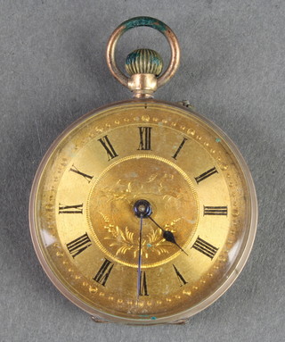 An Edwardian 9ct gold fob watch with engraved face
