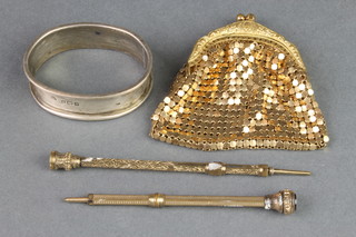 Two gilt propelling pencils with hardstone ends, a silver napkin ring and gilt purse