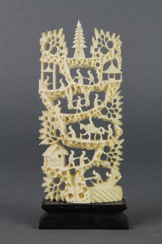 A Cantonese carved ivory study of figures among pavillions 7" 