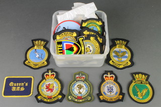 A quantity of cloth military and other badges