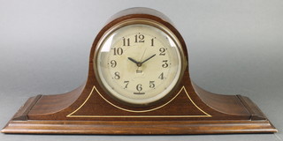 Lorraine, an American electric mantel clock with silvered dial and Arabic numerals contained in a mahogany Admiral's hat shaped case 