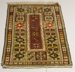A brown ground Afghan rug with multi row borders 37" x 36" 