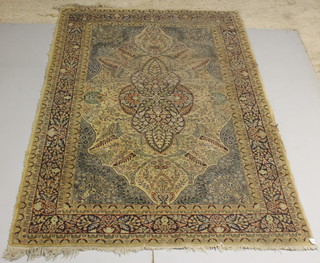 A white and blue ground Persian carpet with central medallion 100" x 60", some wear 