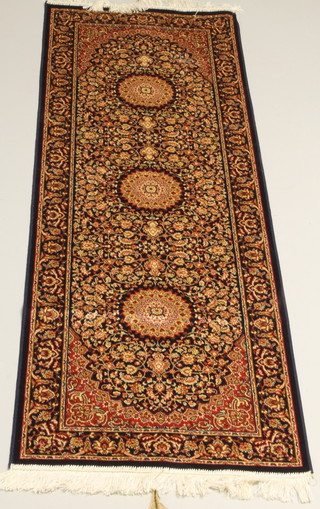 A Persian style blue and red ground Belgian cotton runner 82"l x 27"w 