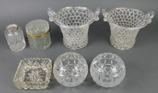 A pair of clear glass basket weave 2 handled vases, a lidded jar and 4 other items