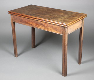 A rectangular Georgian mahogany card table, raised on square tapering supports 26"h x 36"w x 17 1/2"d 
