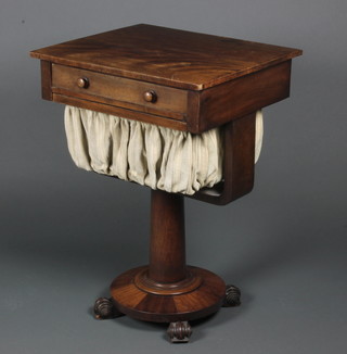 A William IV rectangular mahogany sewing table fitted a drawer and deep basket, raised on a turned column and circular base 27 1/2"h x 20 1/2"w x 18"d 