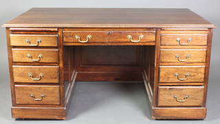 A mahogany kneehole pedestal desk fitted 1 long and 8 short drawers, the pedestal fitted a brushing slide 30"h x 60"w x 35"d 