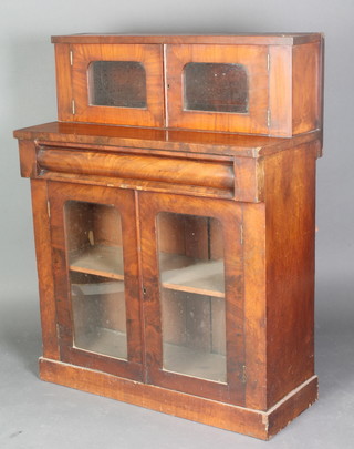 A Victorian mahogany chiffonier, the raised back fitted a cupboard enclosed by glazed panelled door, the base fitted a secret drawer above a cupboard enclosed by arch panelled doors, raised on a platform base 46"h x 36"w x 16"d 