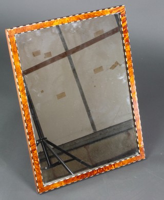 An easel plate mirror contained in a shell and ivory effect frame 23"h x 17"w 