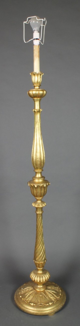 A turned gilt wood and plaster standard lamp 