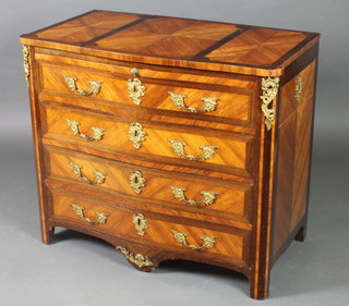 A French commode/dressing chest of serpentine outline with crossbanded top, the centre section fitted a hinged lid with mirror above brushing slide, having 2 drawers to the side above 3 long drawers 30"h x 35"w x 18"d  