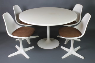 A 1960's Arkana white pedestal dining table  raised on a tulip base together with 4 white revolving tub back chairs with original brown seat pads