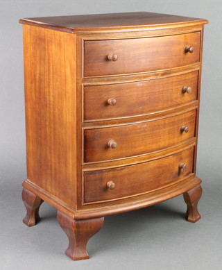 A Victorian style mahogany bow front apprentice chest of 4 long drawers, raised on bracket feet 15 1/2"h x 12"w x 8 1/2"d