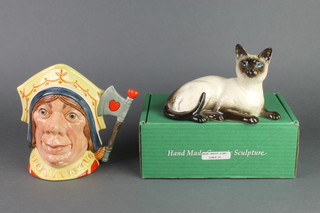 A Royal Doulton figure of a reclining Siamese cat 7", boxed and a ditto character jug - Red Queen D7677 7" 