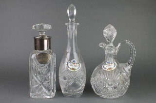 A square spirit decanter and stopper, a mallet ditto and a spirit ewer 