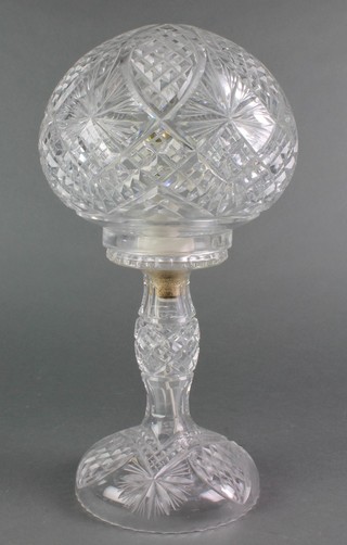 A cut glass table lamp and shade with hobnail decoration 