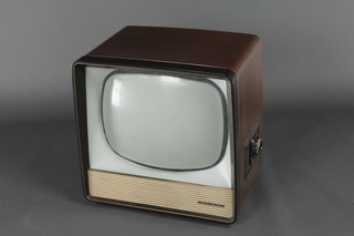 An Ecko vision type T.344 television receiver, contained in a walnut finished case, the screen is 16" 