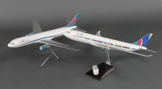 A model of a Boeing 767-300ER aeroplane together with a model of a  Boeing Airbus 330 (port engine is F) 24" 