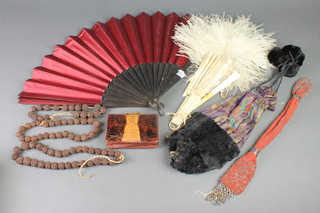 A curious 1930's lady's handbag in the form of an animal with open mask, a miser's purse, 2 carved necklets, a purse and  a fan 