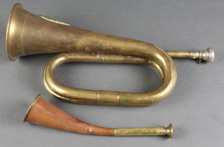 A reproduction brass bugle and a Dutch copper and brass hunting horn 