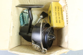 A Mitchell 304 cap fishing reel with spare spool, boxed 