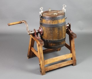 A Dursley iron butter churn complete with stand 