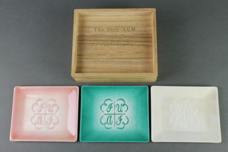 3 Japanese rectangular enamelled dishes to commemorate the 30th anniversary of the Japanese Aviation Insurance Pool Kyoto 1970 4 1/2" x 4", contained in a wooden presentation box 
