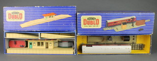 A Hornby Dublo D1 Island platform, boxed, together with a Hornby Dublo T.P. mail van set