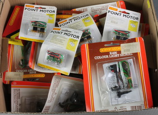 A collection of Hornby point motors, wires, R06 coloured light signals, etc 