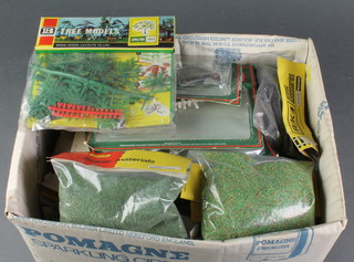 A quantity of various Hornby and other accessories including grass flakes etc 