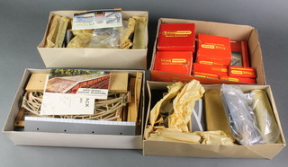 A Hornby R004 Suburban station, boxed, together with 3 shallow boxes containing a collection of Hornby stations and railway buildings 