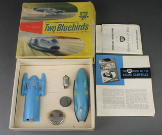 A BP Donald Campbell Bluebird model complete with operating instructions and a BP book of The Racing Campbells, boxed, (slight tear to side of box) 