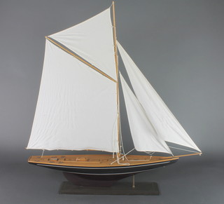A model of a J Class yacht 58"h x 55"l x 10 1/2"w