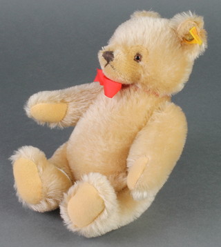 A Steiff teddybear with articulated limbs, ear tag marked 0201/26 9" 