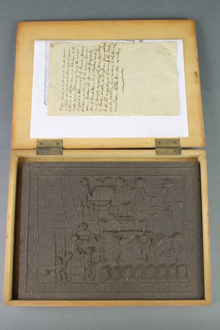 A Chinese tea block together with a handwritten letter contained in a cardboard case with hinged lid 1 1/2" x 8 1/2" x 10" 