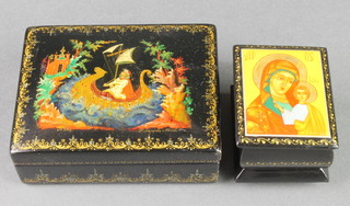 A rectangular Russian lacquered box 2", 1 other box the lid decorated an icon of Christ 1 1/2" x 2" x 1 1/2" 