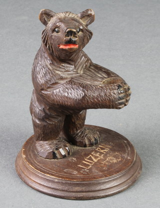A carved bear Swiss pen holder, the base marked Luzern 3 1/2" 