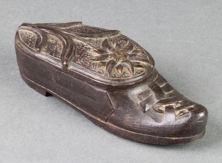 A carved wooden trinket box in the form of a shoe 5" 