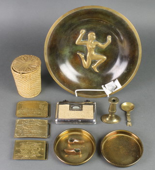 A circular brass dish decorated a female figure 11", 3 reproduction brass belt buckles, minor other sundries 