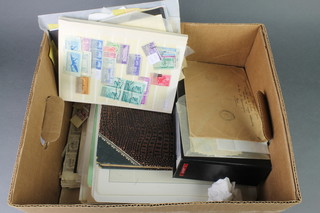 A collection of presentation stamps, stamped envelopes, world stamps etc 